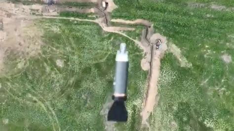 dramatic moment russian soldiers hiding   trench blasted  bomb dropped   ukrainian