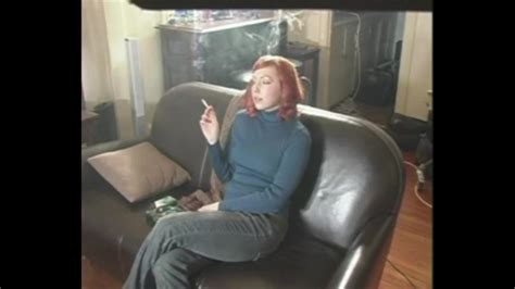 sexy redhead on leather couch smoking a cigarette porn 21