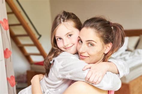 Mother And Daughter Hug Each Other Lovingly Stock Image Image Of