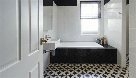 bathrooms  black  white patterned floor tiles