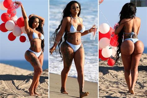 blac chyna shows off her incredible curves in a white bikini on the beach for a valentine s shoot