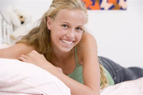 Teenage Girl Lying On Her Bed Stock Image Image Of Adolescence