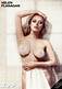 Actress Crista Flanagan poses topless for Playboy.