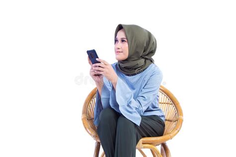 muslim hijab woman sitting in the makeup room while