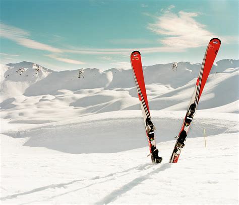Red Pair Of Ski In Snow By Muriel De Seze