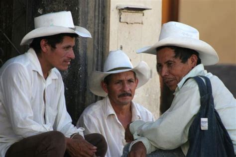 Men In The Street With Typical Sombreros Or Hats Western
