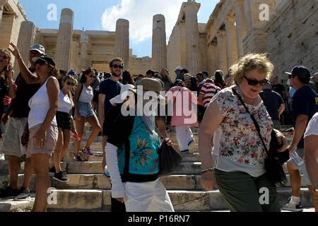 crowd  tourists   aropolis greeces tourism industry  expecting