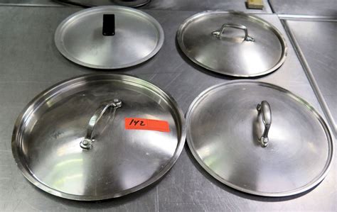 qty  misc size stainless steel pot lids  handles oahu auctions