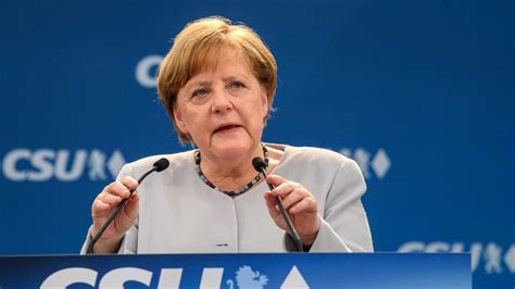 Angela Merkel S Conservative Party Agrees To Pursue Grand Coalition In
