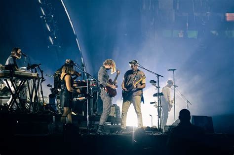 review arcade fire bring dystopian visions  euphoric anthems