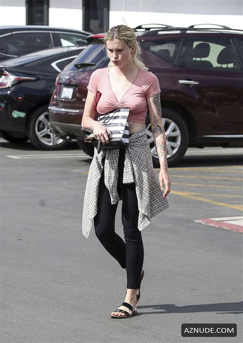 ireland baldwin braless seen in a pink t shirt while shopping at