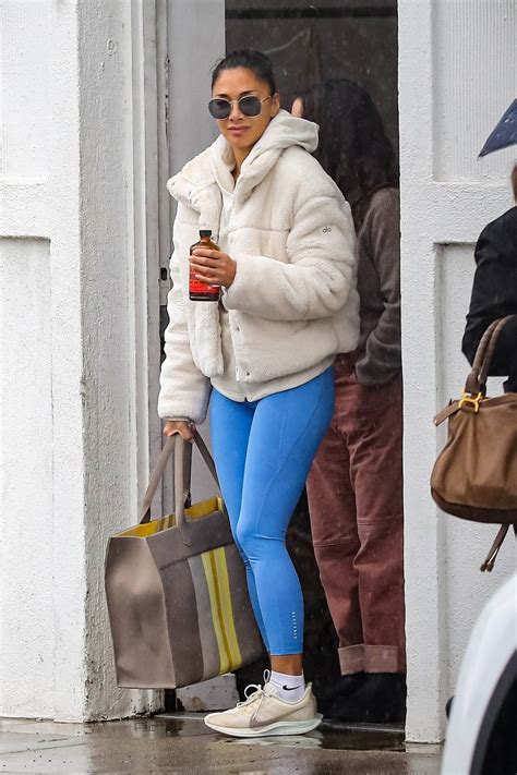 Nicole Scherzinger Flaunts Her Curves In Blue Leggings While Visiting