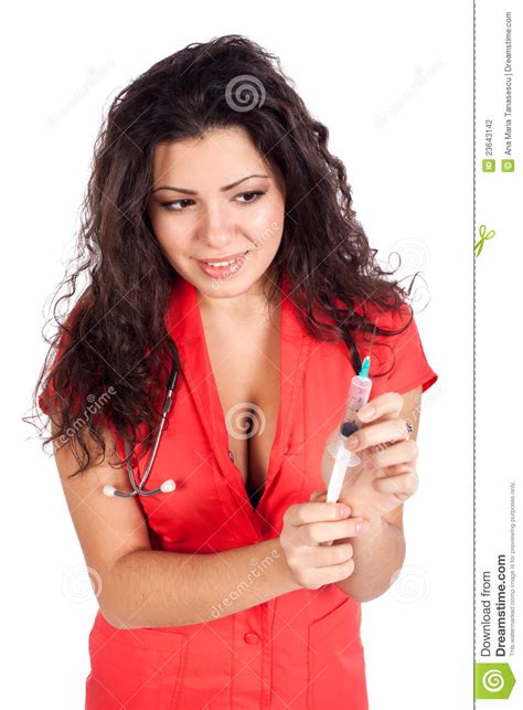 medico sexy della donna o dell infermiera con la siringa fotografia stock immagine di femmina