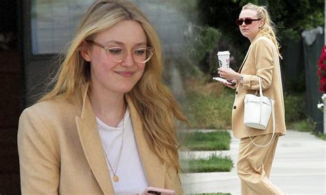 Dakota Fanning Looks Chic In A Camel Suit And White Trainers As She