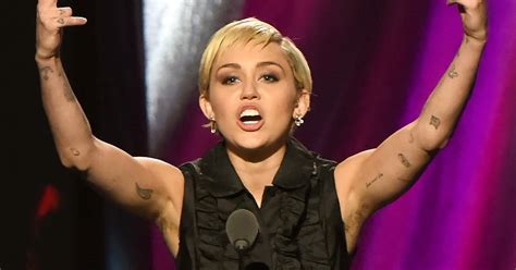 Miley Cyrus Shows Off Her Long Armpit Hair Photos Us Weekly
