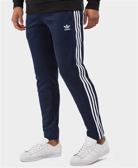 lyst adidas originals adibreak snap track pants  blue  men