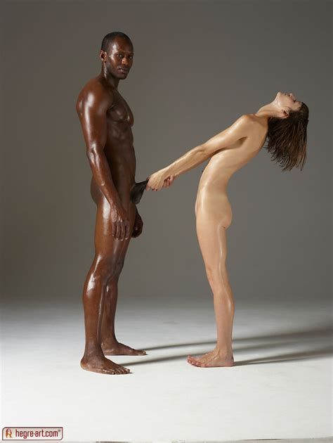 interracial couple of oiled man and girl