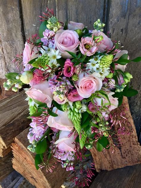 garden style trail bouquet created  lovely bridal blooms flower