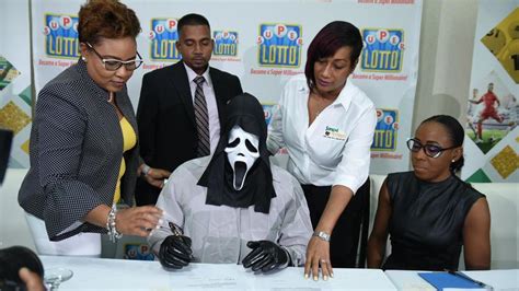 lottery winner in jamaica wears scream mask to hide identity wham
