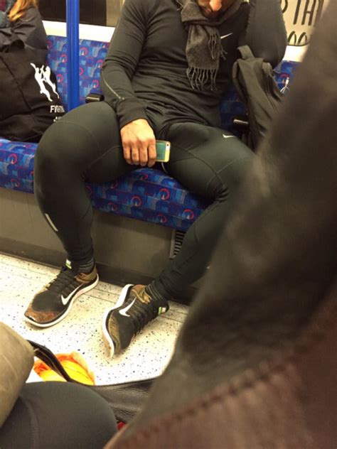 handsome sleeping man in the subway with a huge bulge showing through skintight spandex pants