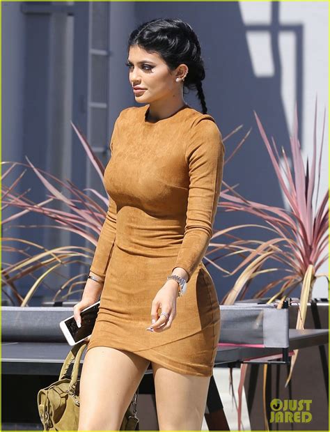 kylie jenner flaunts her curves in skin tight dress photo