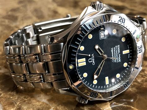 omega seamaster  black wave dial mm automatic  sansom watches rolex