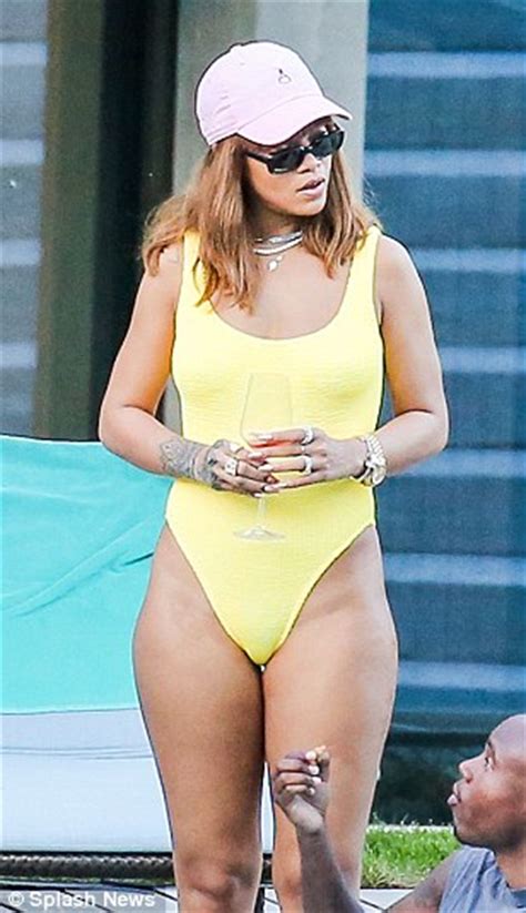 rihanna sexy ass in yellow bikini [ 15 new pics ]