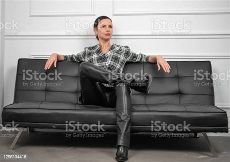 isolated portrait of business woman wearing stylish checkered blazer