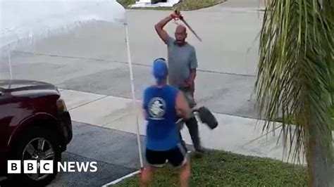 man swings sword over throwaway cart bbc news