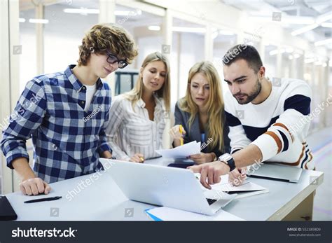 young male female classmates testing  stock photo  shutterstock
