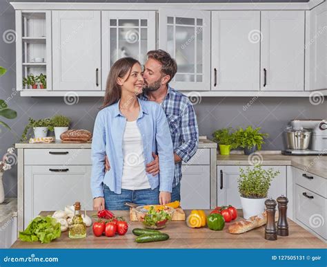 Husband And Wife In The Kitchen Stock Image Image Of Dinner Eating