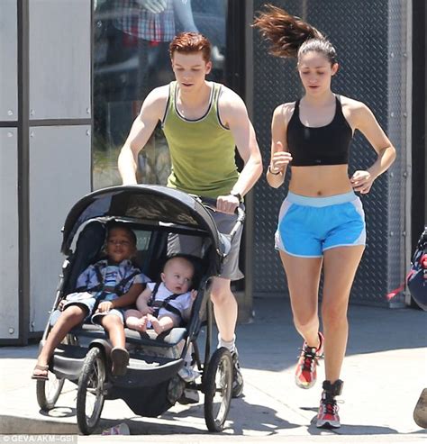 emmy rossum flashes taut stomach while filming jogging scene for shameless with cameron monaghan