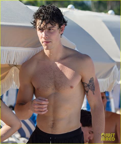 shawn mendes and camila cabello kiss at the beach flaunt hot bodies in