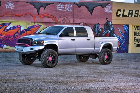 stylish lifted gray dodge ram featuring pink accents caridcom gallery