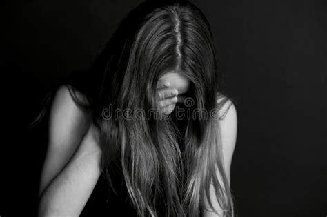shame shyness  girl hiding face  hair stock image image  beautiful sadness