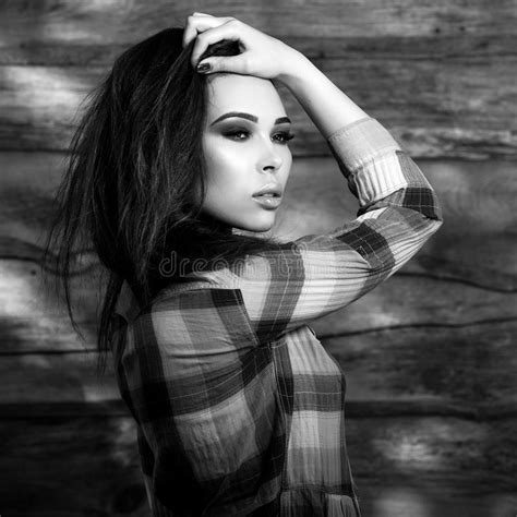 Young Sensual And Beauty Brunette Woman Pose On Wooden Background Black