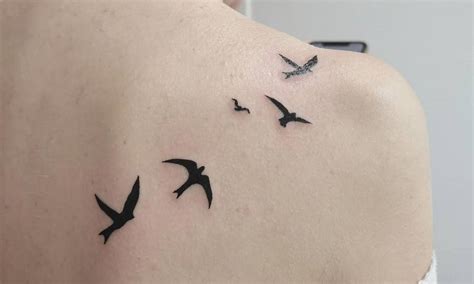 flying birds tattoo  ribs