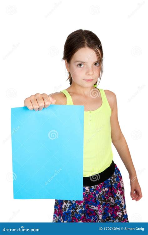 primary aged girl holding sheet  paper stock photo image  white