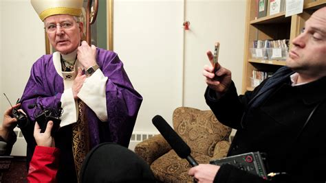 U S Archbishop Resigns Over Sex Abuse Scandal