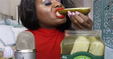 this woman eats pickles into a mic to trigger asmr for people nowthis