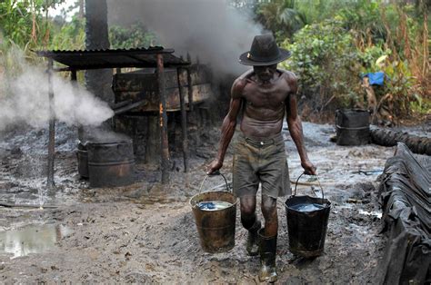 oil thieves bleed nigeria report  officials profit   york times