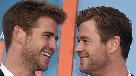 chris hemsworth ribs his brother liam but his shirtless video wins