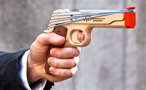 elastic precision rubber band guns    feel  bond gadget flow