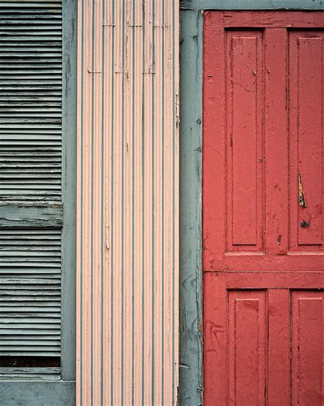 teal shutters coral door photograph by dick wood