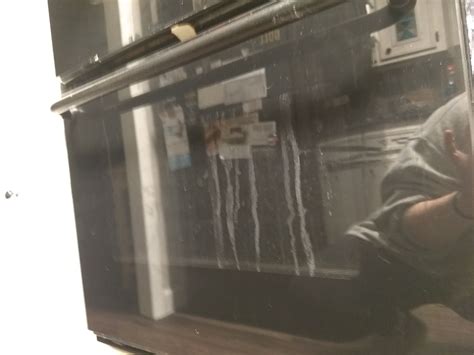 clean oven doors   glass panes mack packing clean