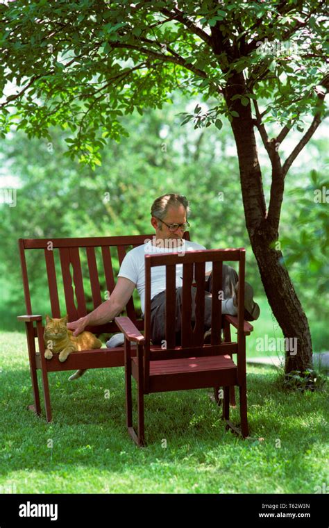 man sitting  shade  res stock photography  images alamy