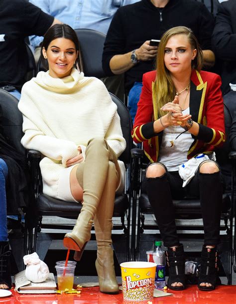 kendall jenner s over the knee boots at basketball games
