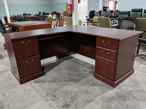 mahogany  shaped desk  drawers madison liquidators