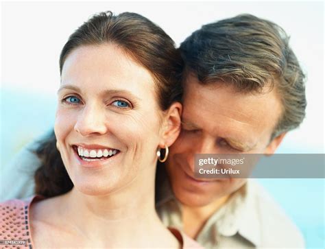 Portrait Of A Cute Mature Couple Enjoying Each Others Company High Res