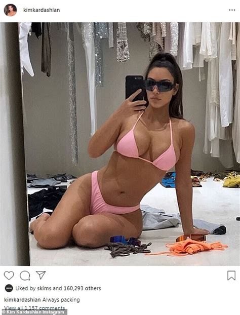 kim kardashian oozes sex appeal in bubblegum pink bikini as she poses